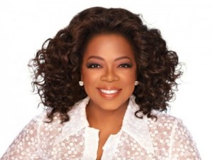 Oprah Winfrey Winfrey was born into poverty in rural Mississippi to a teenage single mother and later raised in an inner-city Milwaukee neighborhood. She experienced considerable hardship during her childhood, claiming to be raped at age nine and becoming pregnant at 14; her son died in infancy. Sent to live with the man she calls her father, a barber inTennessee, Winfrey landed a job in radio while still in high school and began co-anchoring the local evening news at the age of 19. Her emotional ad-lib delivery eventually got her transferred to the daytime-talk-show arena, and after boosting a third-rated local Chicago talk show to first place, she launched her own production company and became internationally syndicated. 