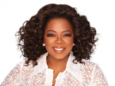 Oprah Winfrey Winfrey was born into poverty in rural Mississippi to a teenage single mother and later raised in an inner-city Milwaukee neighborhood. She experienced considerable hardship during her childhood, claiming to be raped at age nine and becoming pregnant at 14; her son died in infancy. Sent to live with the man she calls her father, a barber inTennessee, Winfrey landed a job in radio while still in high school and began co-anchoring the local evening news at the age of 19. Her emotional ad-lib delivery eventually got her transferred to the daytime-talk-show arena, and after boosting a third-rated local Chicago talk show to first place, she launched her own production company and became internationally syndicated.