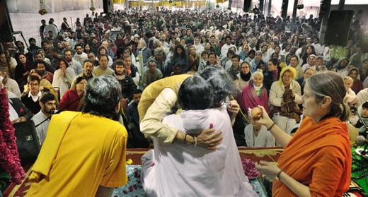 Amma’s Multifaceted Empire, Built on Hugs