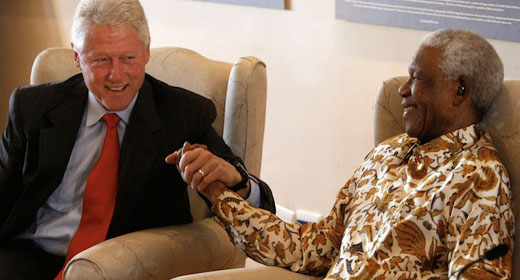 Bill-Clinton-Visits-Mandela-Awaken