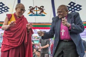 Dalai Lama-and-Tutu-Dancing-awaken