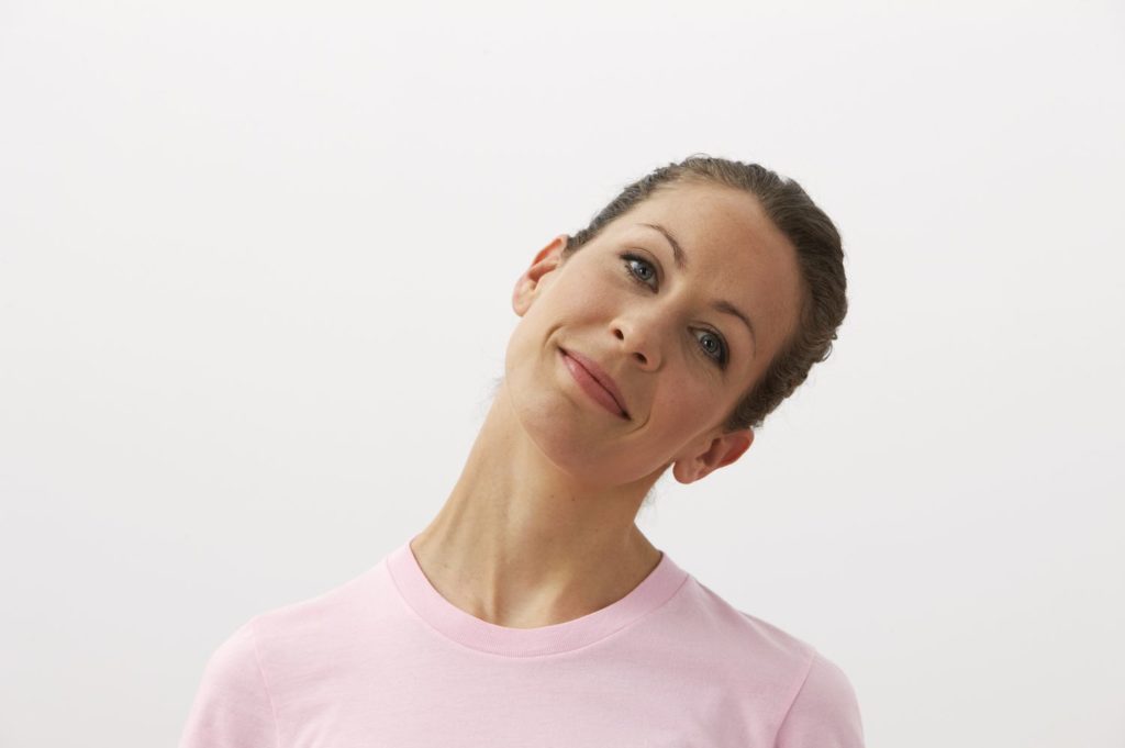 smiling-woman-with-head-and-neck-extended-to-left-awaken