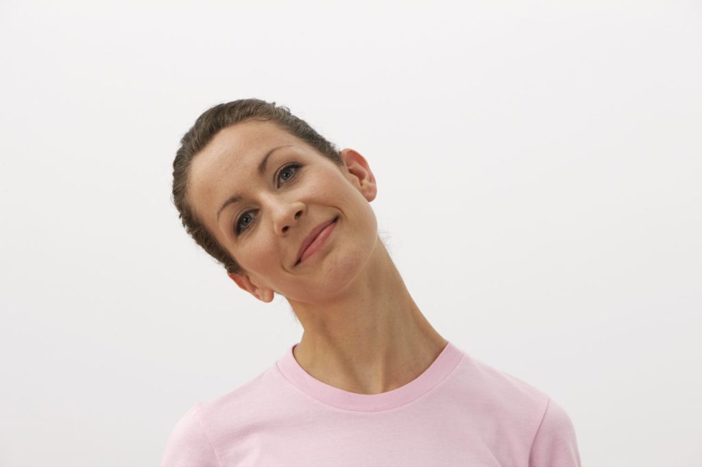 smiling-woman-with-head-and-neck-extended-to-right-awaken