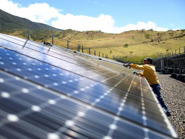 Solar panels, including this one in Guanacaste, Costa Rica, produce a small portion of the renewable energy