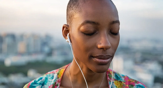 listening-music-headphones-eyes-closed-AWAKEN